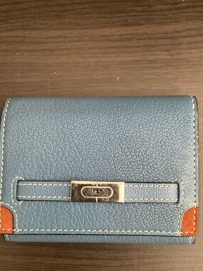 EUC Tory Burch Blue Leather Bifold Wallet with Tan, orange, yellow accents.
